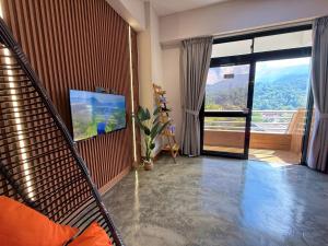 Et tv og/eller underholdning på The Almost Touching the Stars Suite + 39 billeder