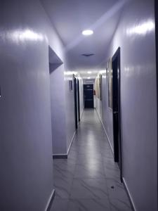 a hallway of a hospital with at Grand Churchill Luxury Hotel in Orimedu +1 photo