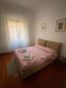 Ένα ή περισσότερα κρεβάτια σε δωμάτιο στο Casa Vacanze The Sunbeam