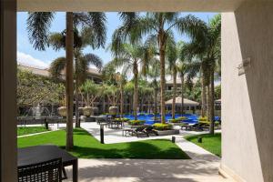a view of the pool at the resort at Dusit Thani LakeView Cairo in Cairo +146 photos