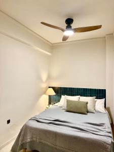 Postel nebo postele na pokoji v ubytování Komi beach Maisonette