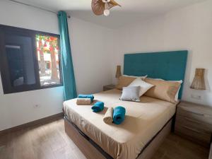 Postel nebo postele na pokoji v ubytování Rosa Oasis Dunas