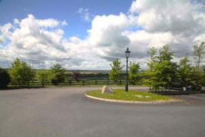 a street light in the middle of a parking lot at Tara View Apartments in Garristown +21 photos