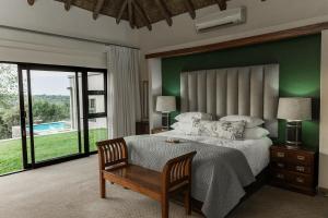 Katil atau katil-katil dalam bilik di Bona Bona Game Lodge