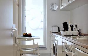Η κουζίνα ή μικρή κουζίνα στο Ferienwohnung am Bühl