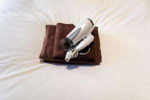 a pen sitting on top of a bed at Shibuya E-address 205 in Tokyo