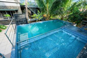 Πισίνα στο ή κοντά στο SSS Farm House