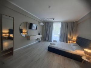 Ένα ή περισσότερα κρεβάτια σε δωμάτιο στο Bella studio-only adults