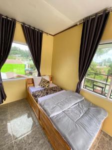 Billede fra billedgalleriet på WISMA SUNRISE GUEST HOUSE 10 minutes by walking to the big fruit market in Berastagi i Berastagi