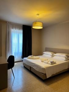 Ένα ή περισσότερα κρεβάτια σε δωμάτιο στο Relais Appartamento Castello Magona - Venturina Terme