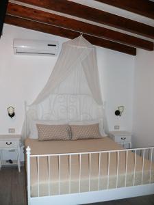Katil atau katil-katil dalam bilik di Venustas Apartaments