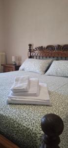 Postel nebo postele na pokoji v ubytování Podere Muracciolo