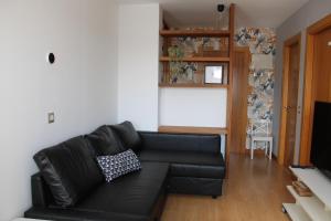 Χώρος καθιστικού στο Coqueto apartamento con parking by beBalmy