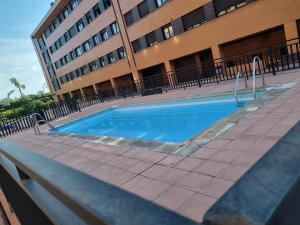 Πισίνα στο ή κοντά στο Coqueto apartamento con parking by beBalmy