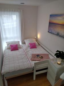 Ένα ή περισσότερα κρεβάτια σε δωμάτιο στο Sandifin Appartement