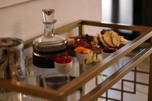 a tray of food on a table with snacks at Hotel Angeleno in Los Angeles