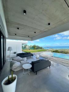 Fotografie z fotogalerie ubytování Havre de paix luxueux avec vue mer imprenable v destinaci Dumbéa