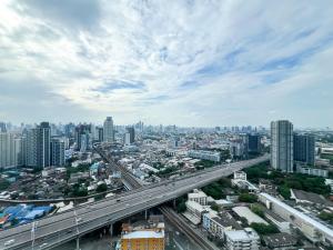 an overhead view of a city with a highway at Elegant 1BR Condo - Ultra Fast WiFi - BTS On-Nut in Bangkok