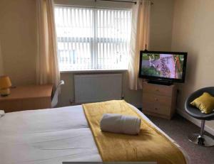 TV a/nebo společenská místnost v ubytování 34 - Room 3 - Uplands