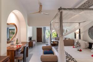 Postel nebo postele na pokoji v ubytování Kiwengwa Beach Resort