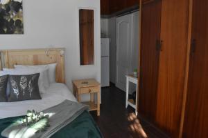 Ένα ή περισσότερα κρεβάτια σε δωμάτιο στο Feet Up at 25