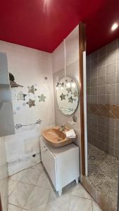 a bathroom with a sink and a shower at Maison familiale à la campagne in Vallères +42 photos