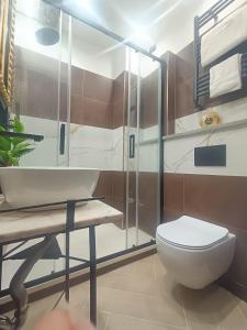 Ένα μπάνιο στο BNB Frescoes Rooms San Frediano