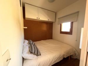 Ένα ή περισσότερα κρεβάτια σε δωμάτιο στο Ski aux pieds