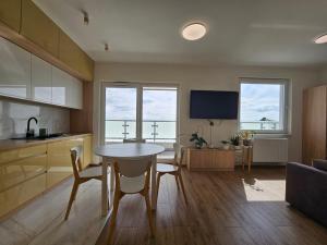 Η κουζίνα ή μικρή κουζίνα στο Apartament Lumen Jasień