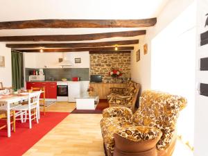 Posezení v ubytování Apartment Les jardins by Interhome