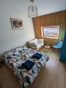 Postel nebo postele na pokoji v ubytování La Terrasse du Tarn + 1 fotografie