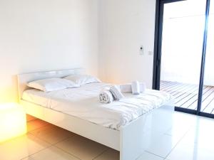 Ένα ή περισσότερα κρεβάτια σε δωμάτιο στο Apartment Nautilus by Interhome