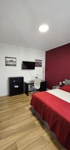 Postel nebo postele na pokoji v ubytování Orienty Home Pentacoro
