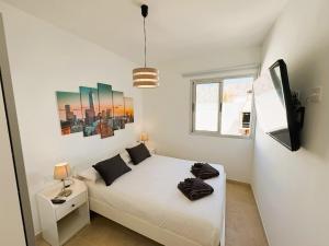 En eller flere senge i et værelse på Villa New York + 37 billeder