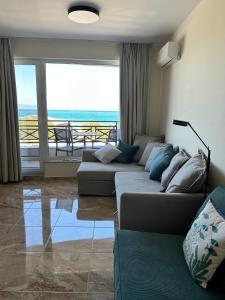 Et opholdsområde på Sunrise Apartment