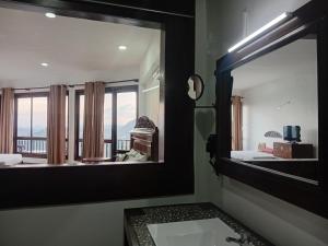 Ένα ή περισσότερα κρεβάτια σε δωμάτιο στο Lawan One Kandy +112 φωτογραφίες
