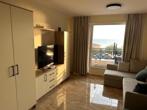 Et tv og/eller underholdning på Sunrise Apartment