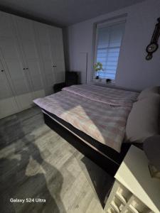 En eller flere senge i et værelse på Apartamenty U Władzia