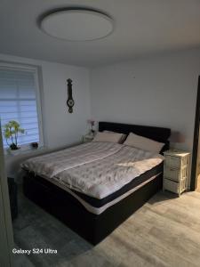 En eller flere senge i et værelse på Apartamenty U Władzia