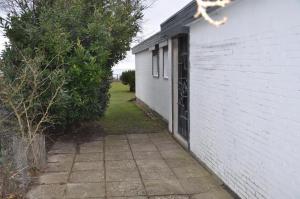 Bygningen som lejligheden ligger i + 7 billeder