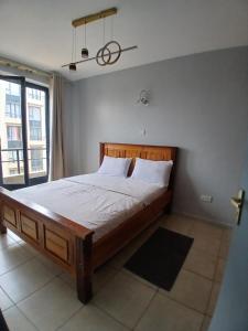 Postel nebo postele na pokoji v ubytování Residence next door 2br Coral + 54 fotografií