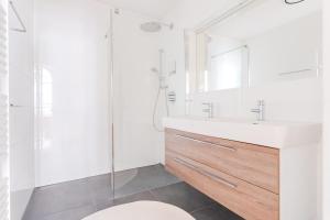 Koupelna v ubytování Hakuna - Penthouse Franziskanerplatz - Rooftop