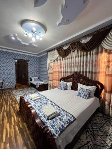 En eller flere senge i et værelse på Aminzar Guest House + 44 billeder