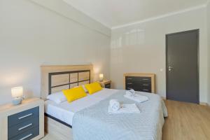 En eller flere senge i et værelse på Lisboa no Sado - By Y Concept