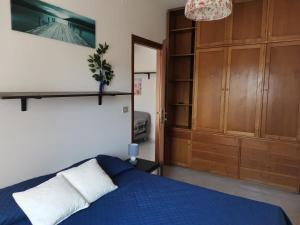 Ένα ή περισσότερα κρεβάτια σε δωμάτιο στο Casa Mazzini
