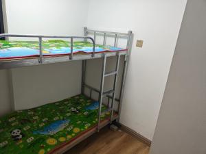 Ένα ή περισσότερα κρεβάτια σε δωμάτιο στο meilai-hostel