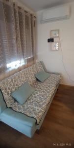 Ένα ή περισσότερα κρεβάτια σε δωμάτιο στο Apartman Orhideja