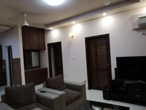 Μια τηλεόραση ή/και κέντρο ψυχαγωγίας στο Grande Apartment luxury suite