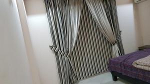 Ένα ή περισσότερα κρεβάτια σε δωμάτιο στο Grande Apartment luxury suite