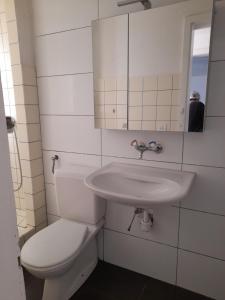 Koupelna v ubytování B & B Wohlen Central